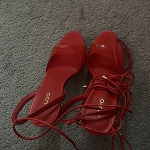red heel tie and adjustable straps